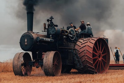 1905 150 Case steam tractor side view smoke coming out stack