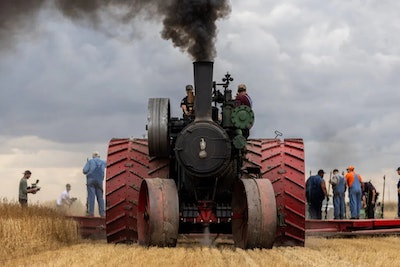 1905 150 Case steam tractor front view smoke coming out stack