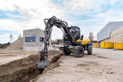 MECALAC 12MTX excavator digging trench