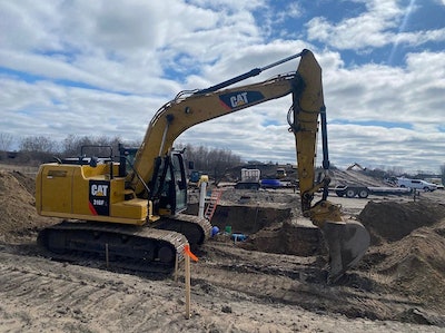 Cat excavator on T Scherber jobsite