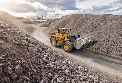 Volvo L350H driving out of quarry