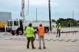 Sales Manager Clint Nichols demonstrates the maneuverability of the boom on the 38Z4 XXT truck mounted concrete pump.