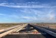 A bridge slide along SR 79 saw ADOT use an innovative approach to replace this key bridge in Florence by assembling the new structure next to the existing bridge and then sliding it into place. 
(ADOT photo)