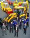 Employees celebrate the JCB backhoe's 70th birthday.   (Photo courtesy of JCB)