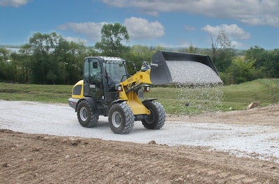 Wacker Neuson WL52 hauling stone