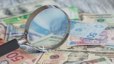 1706305765_57323_en_767c8_50196_financials-money-magnifying-glass.jpg - Machines Wiki