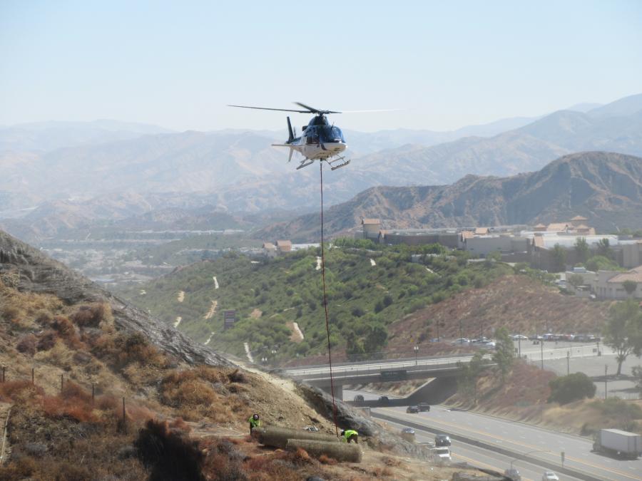 Sukut Construction employed the use of a helicopter to transport a vital material for an erosion project in northern Los Angeles County.