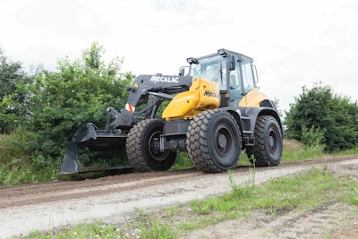 MECALAC AS1600 wheel loader cutting dirt roadside brush