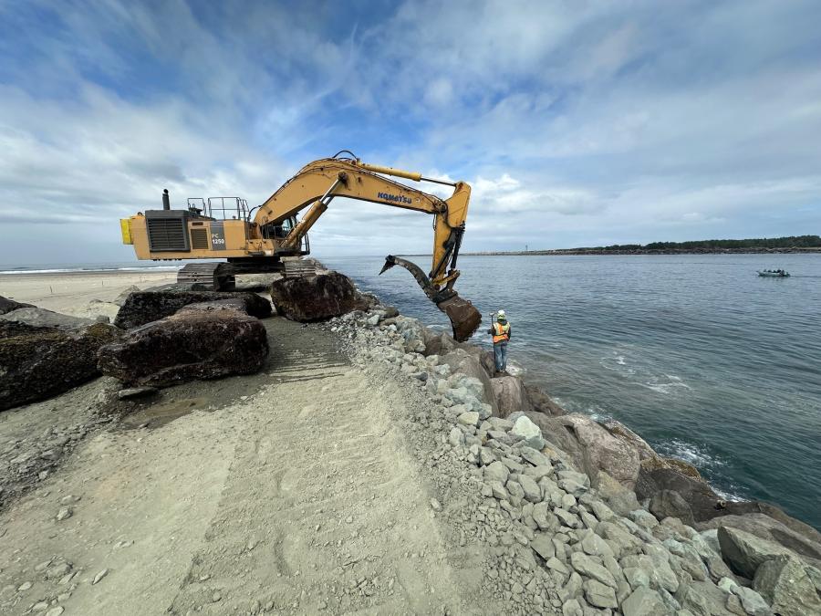 A Komatsu excavator is ready to work at the Tillamook South Jetty repair project.