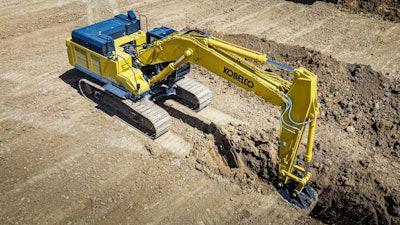 aerial view KOBELCO SK520LC excavator digging trench