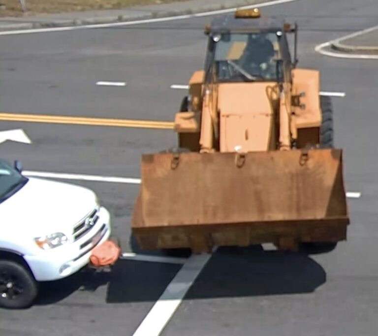 Video: Runaway Wheel Loader Hits SUV, Signs at Busy Intersection