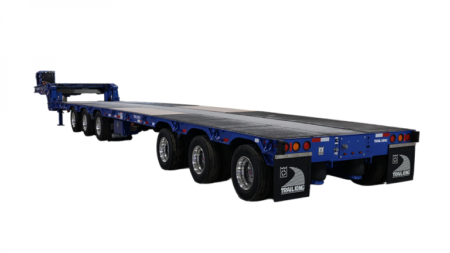 Blue multi-axle flatbed trailer designed for heavy equipment transport, shown from the rear-left side with a long platform and blue frame.