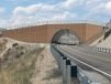 A wildlife overpass in Idaho is credited with a reduction in animal collisions.   (Idaho Transportation Department rendering)