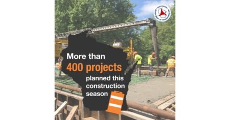 Wisconsin state silhouette with bold '400 projects' text overlaid; construction workers and equipment visible in the background; DOT logo at top right.