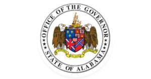 Seal of the Office of the Governor, State of Alabama, featuring a heraldic shield with banners and an eagle.