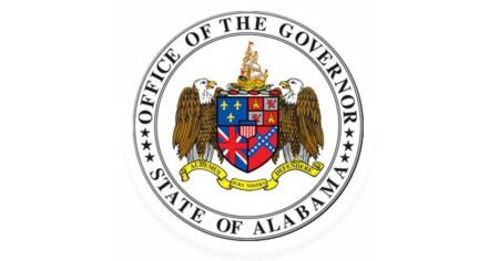 Seal of the Office of the Governor, State of Alabama, featuring a heraldic shield with banners and an eagle.