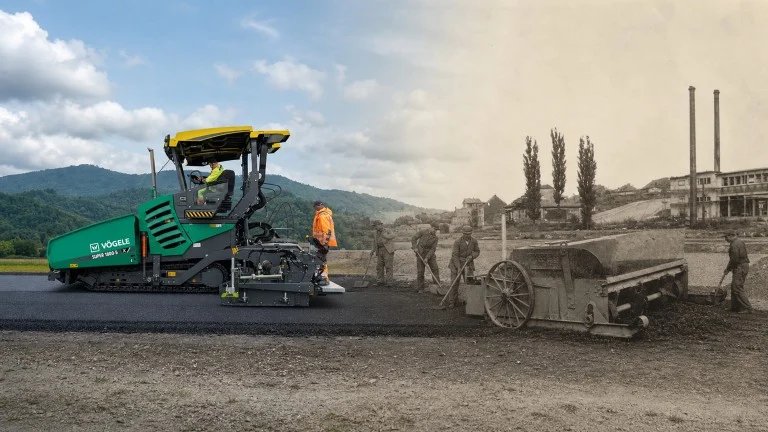 1783457529_63964_en_12e68_66117_jv-photo-190-years-001-prjpg - Machines Wiki Modern asphalt paver lays new road as workers guide the surface, with a vintage steam roller visible in a split black-and-white background.